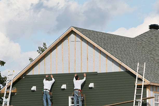 Professional Emergency Siding Repair technician working in New Vienna, OH
